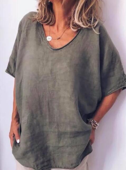 Woman wearing olive green breathable loose t-shirt