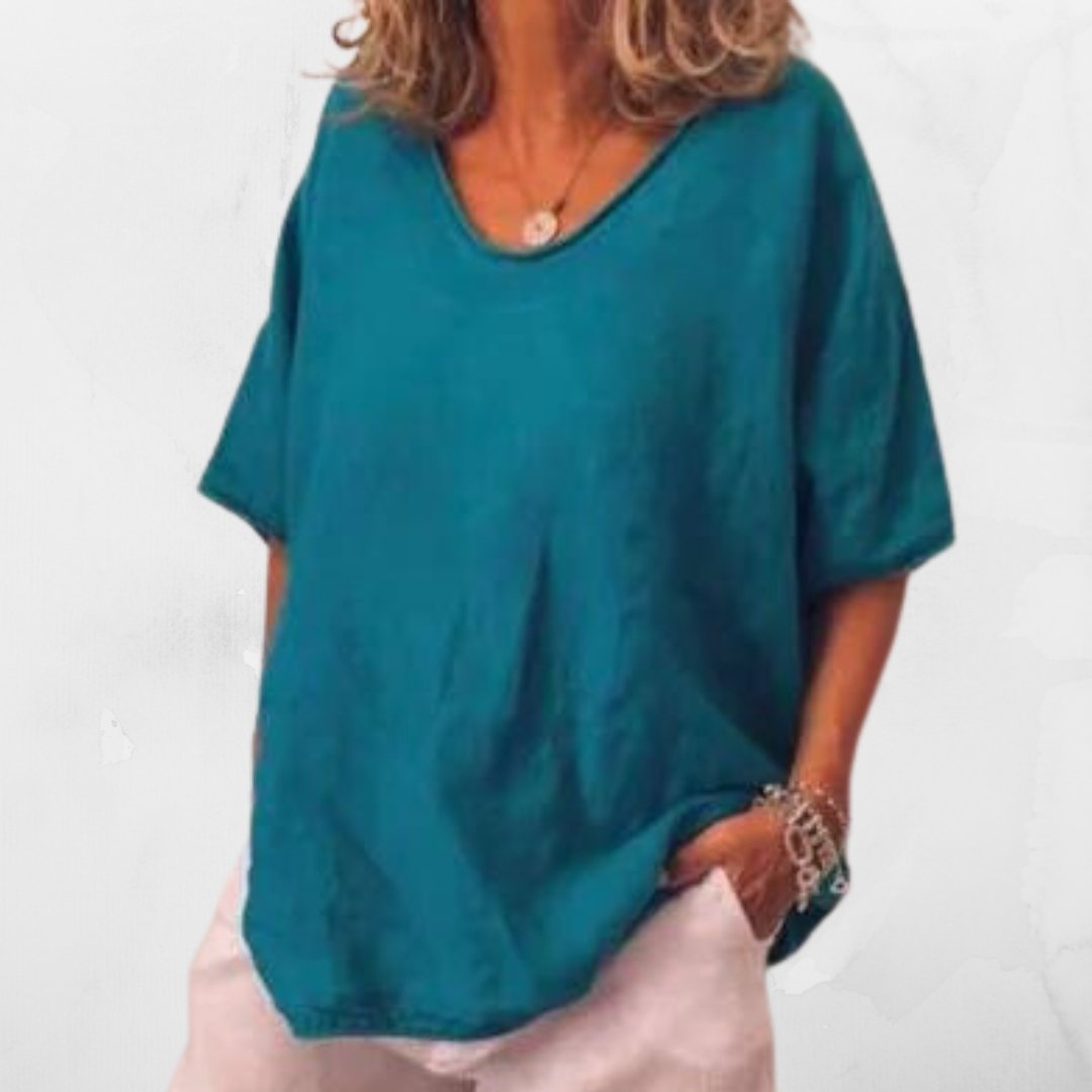 Oversized shirt ideal for layering or relaxed styling during summer outdoor activities.