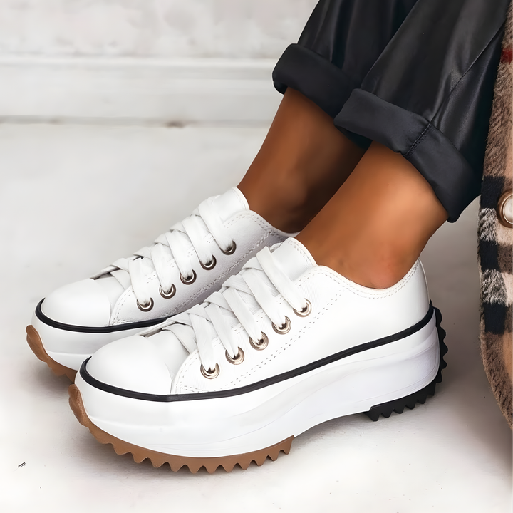 Pair of women's comfort sneakers displayed together on a neutral background