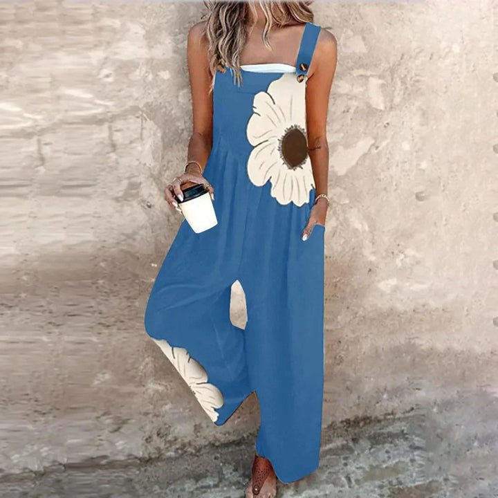 Woman showcasing a blue bohemian floral pattern wide-leg overall jumpsuit