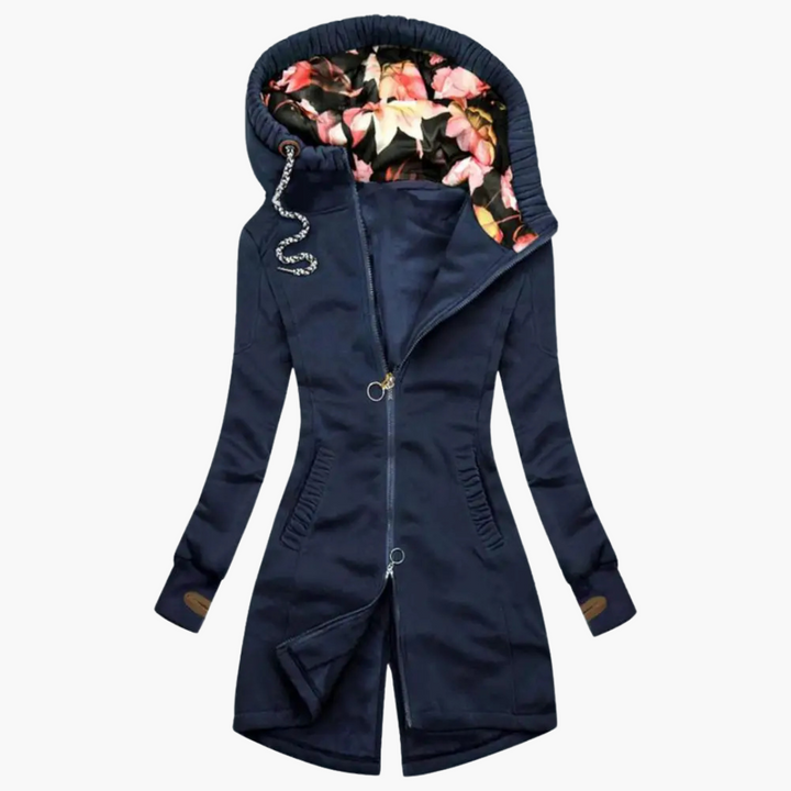 Women's blue waterproof hiking jacket with modern design