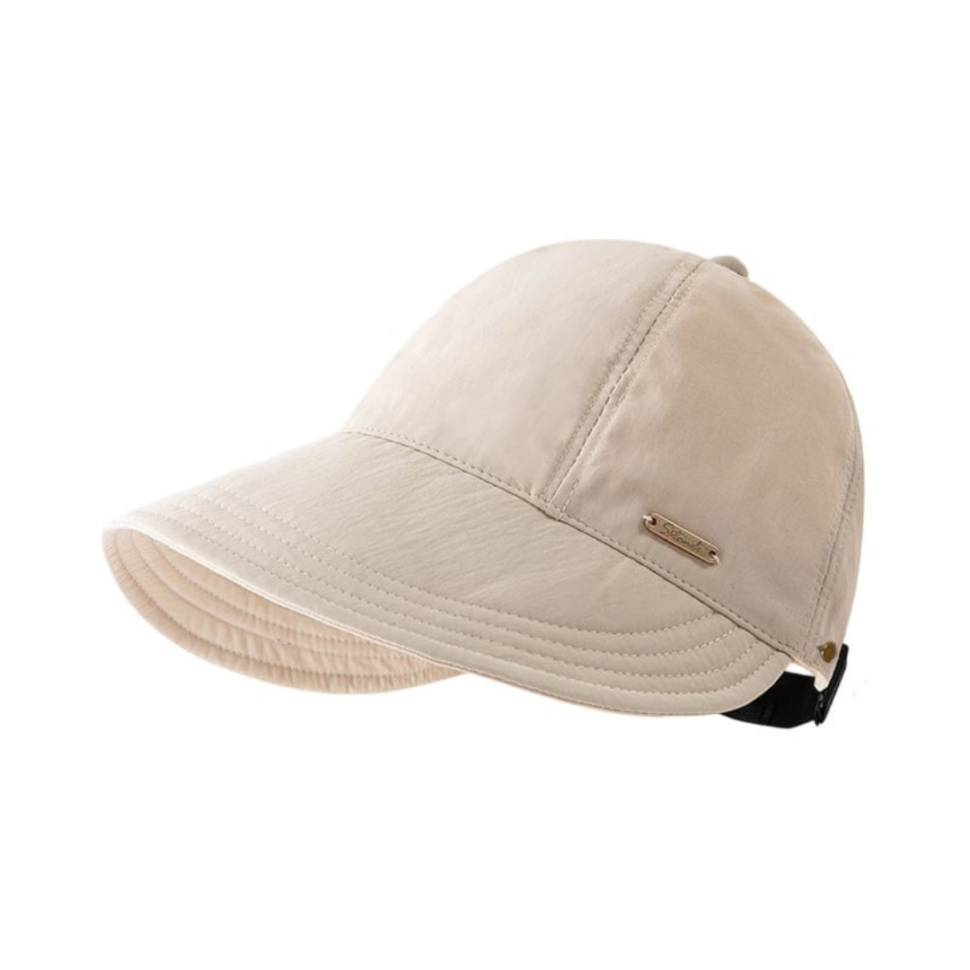 Women's wide-brim sun hat in beige colour viewed from the side