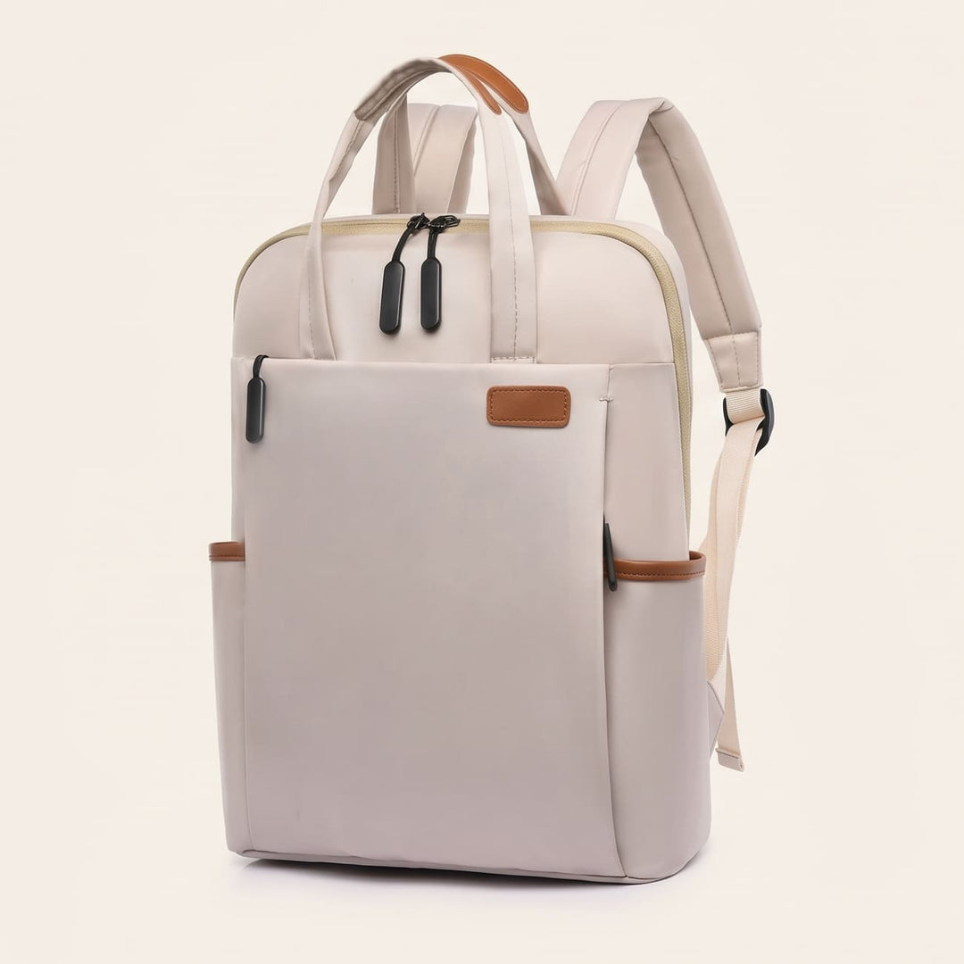 Cream anti-theft travel backpack front view with top handle and dual zippers