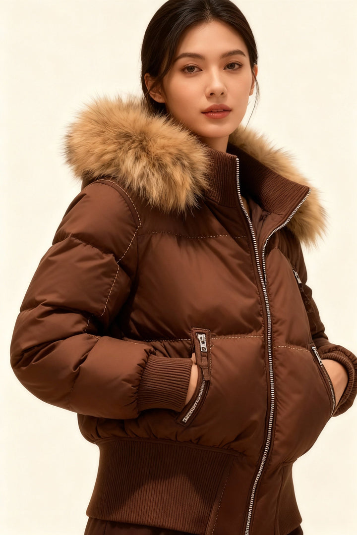 Model wearing a brown quilted winter puffer jacket with faux fur hood