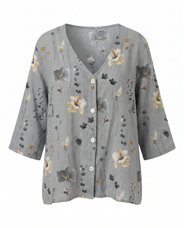 Textured fabric close-up of the women's floral print top