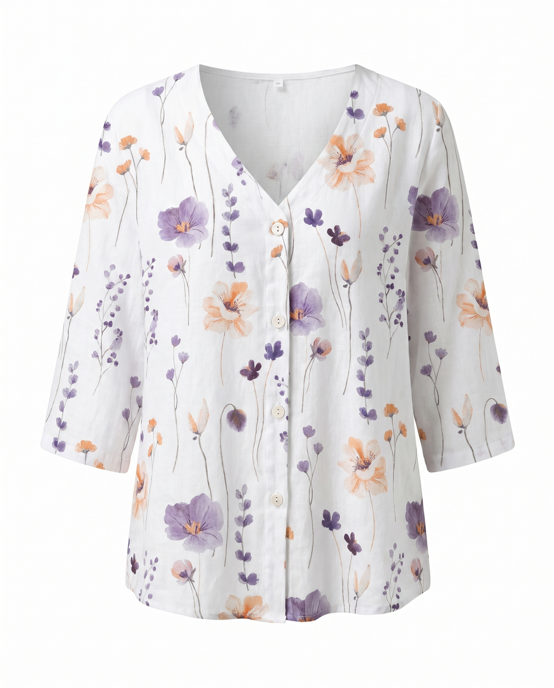 Detailed shot of fabric and sleeve hem on women's floral shirt