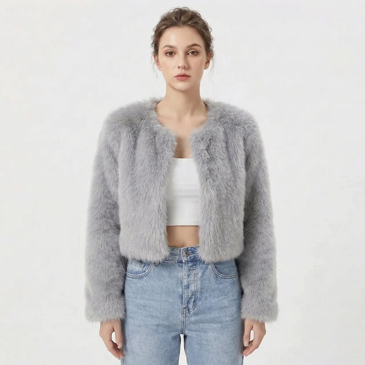 Model wearing light grey cropped fluffy jacket