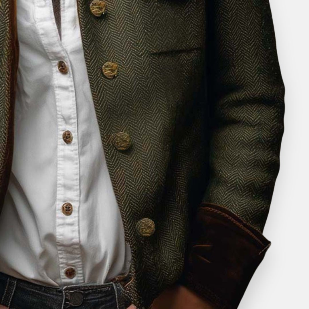 Close-up of decorative buttons and textured herringbone weave on the blazer