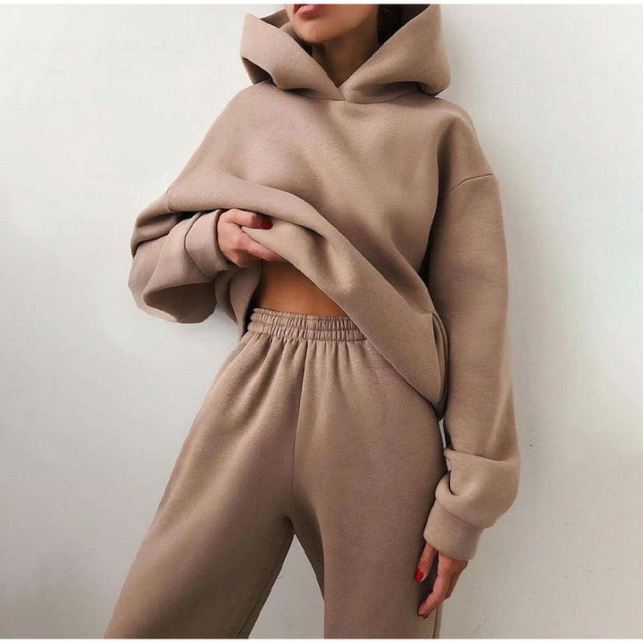 Side angle of the women's tracksuit showing the high waist jogger fit