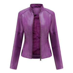 Close-up of the mandarin collar and zipper detail on a stylish women's black leather jacket.