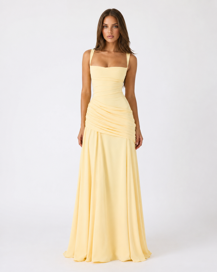 Model wearing yellow square neck side drape maxi dress
