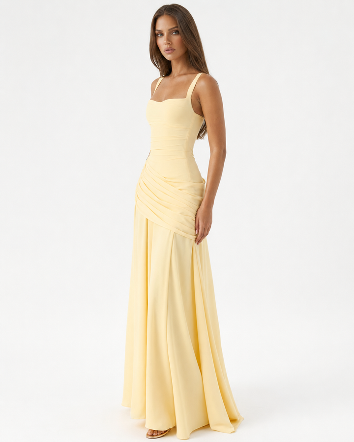 Long evening dress designed with a trendy square collar and drape