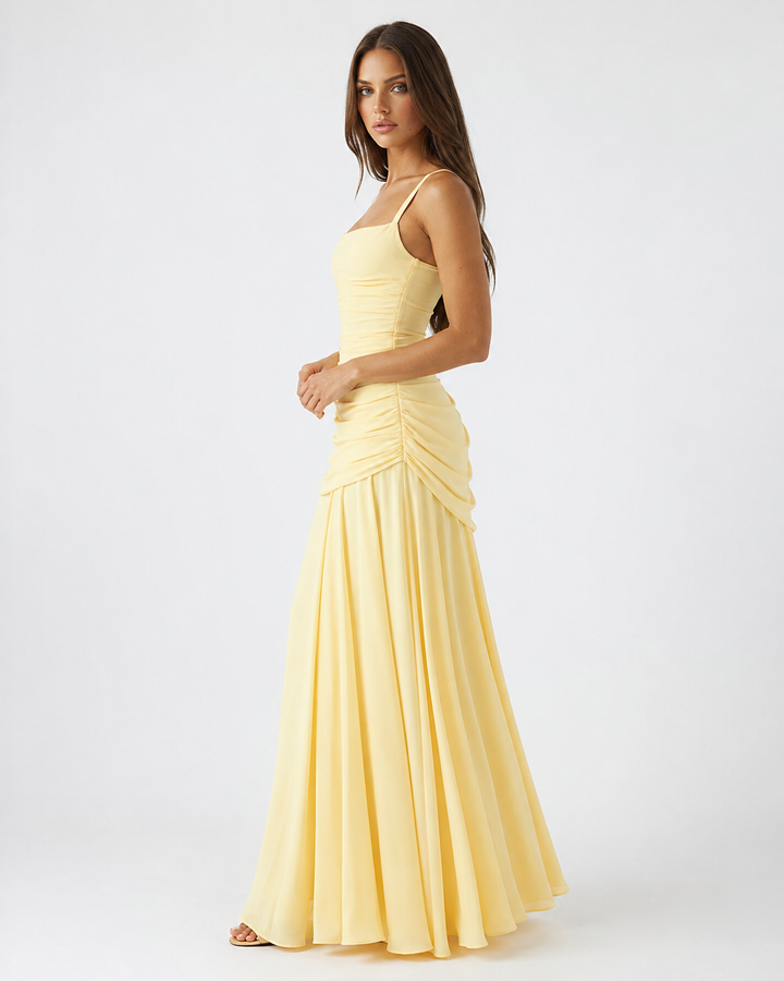 Stylish women's party wear maxi dress with elegant side drape