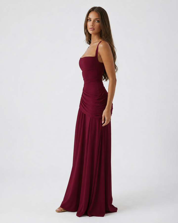 High-fashion formal wear maxi dress with elegant draped skirt