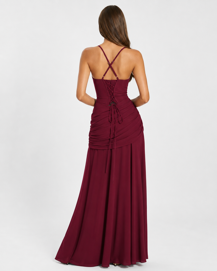 Alluring party dress featuring a clean square neck and drape