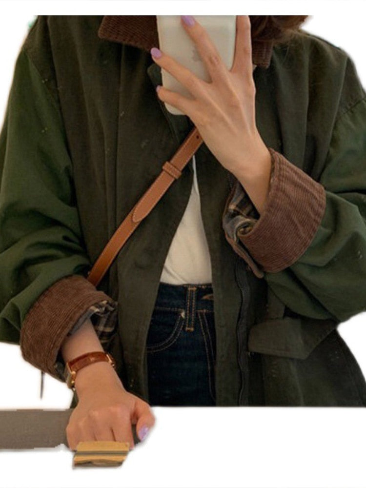 Detail view of the sleeve cuffs and buttons on the women's jacket