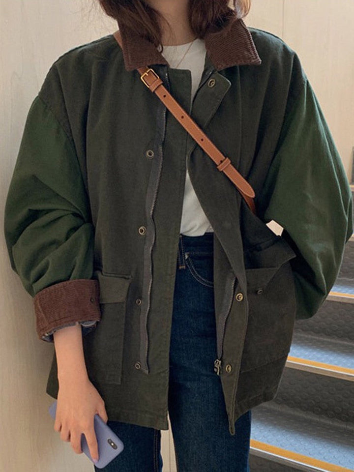 Woman wearing an army green oversized casual jacket outdoors