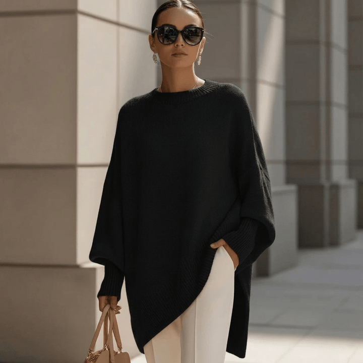 Comfortable oversized pullover sweater featuring a relaxed knit fit