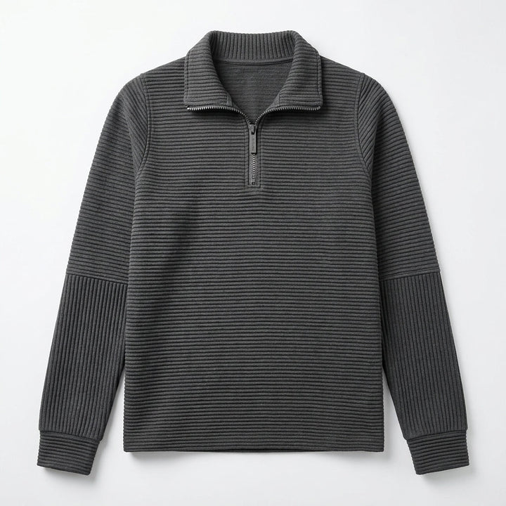Detailed shot of ribbed cuffs and soft knit fabric on fashionable layering top