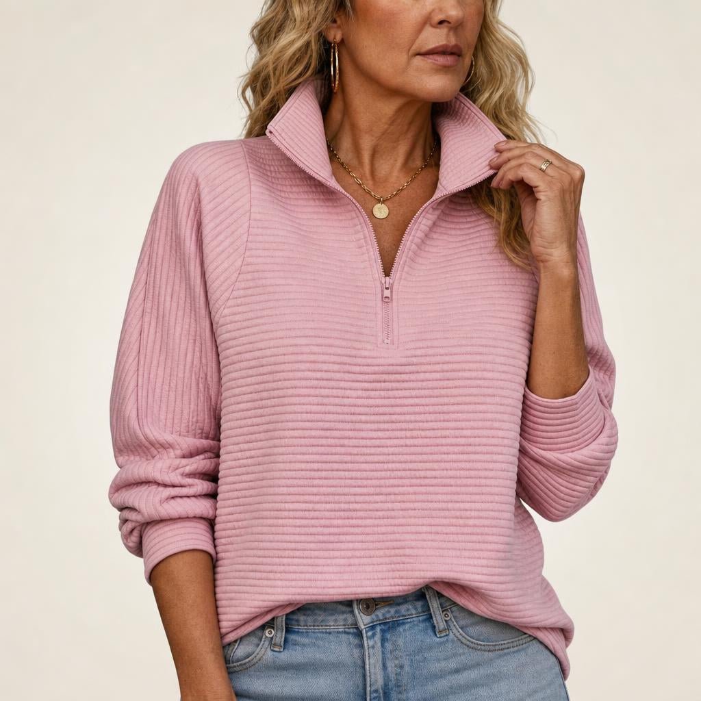 Womens half-zip funnel neck sweater showing cozy knit texture and ribbed hem