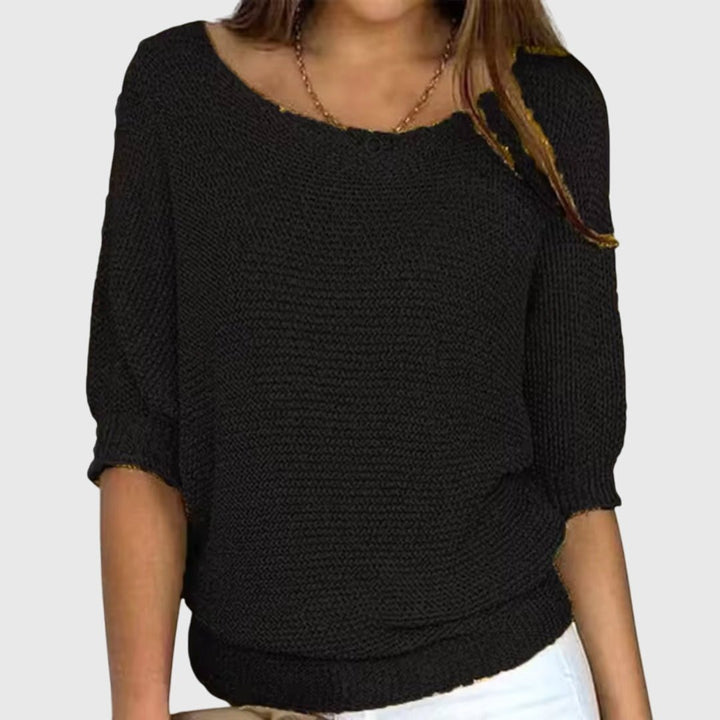 Women's black relaxed fit knit sweater for versatile daily styling