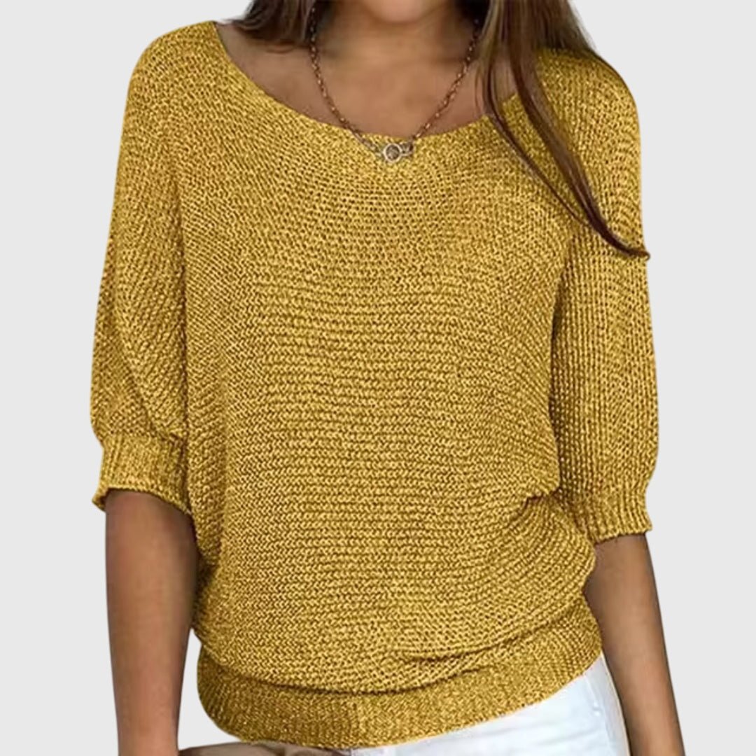 Long sleeve women's sweater featuring a cozy knit design for fall fashion trends