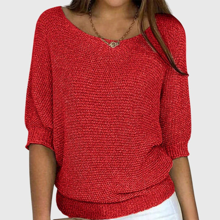 Women's red relaxed fit knit sweater with soft texture