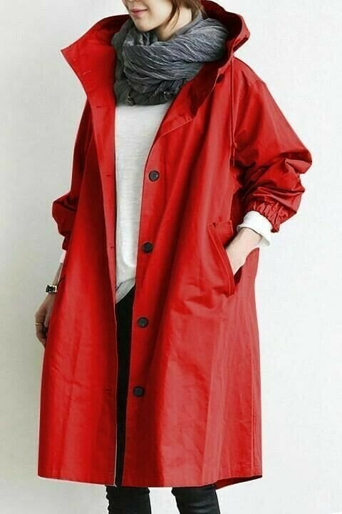 Womens hooded windbreaker jacket interior lining and quality seam sealing details.