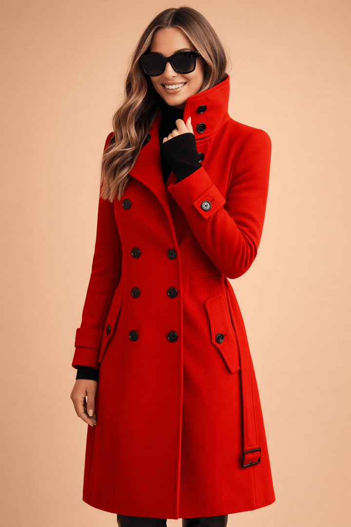 Woman wearing a vibrant red double-breasted winter coat with high collar