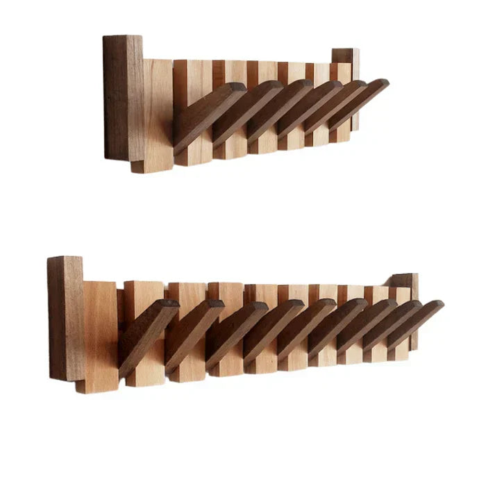 Entryway organization setup featuring a stylish wooden piano wall hook