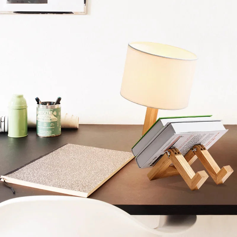 Close-up of the articulated wooden joints and movable arms on the robot lamp