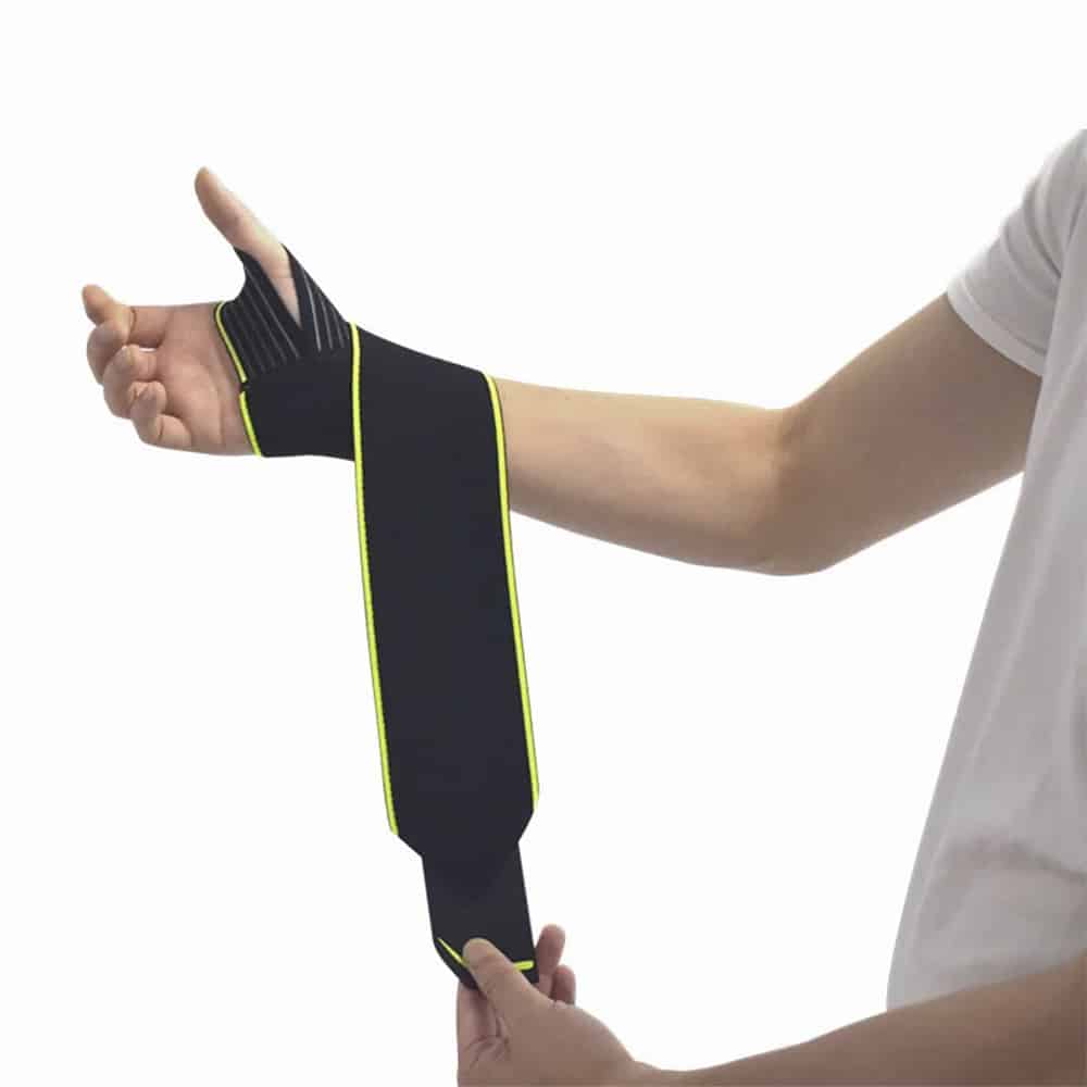 Demonstrating the strap design of the unisex wrist and thumb support brace