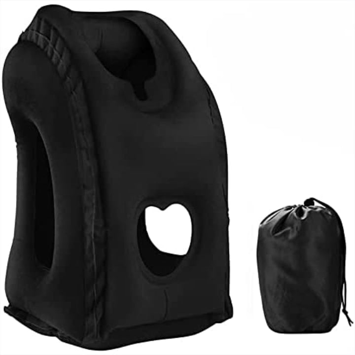 Black inflatable travel pillow shown with matching storage pouch