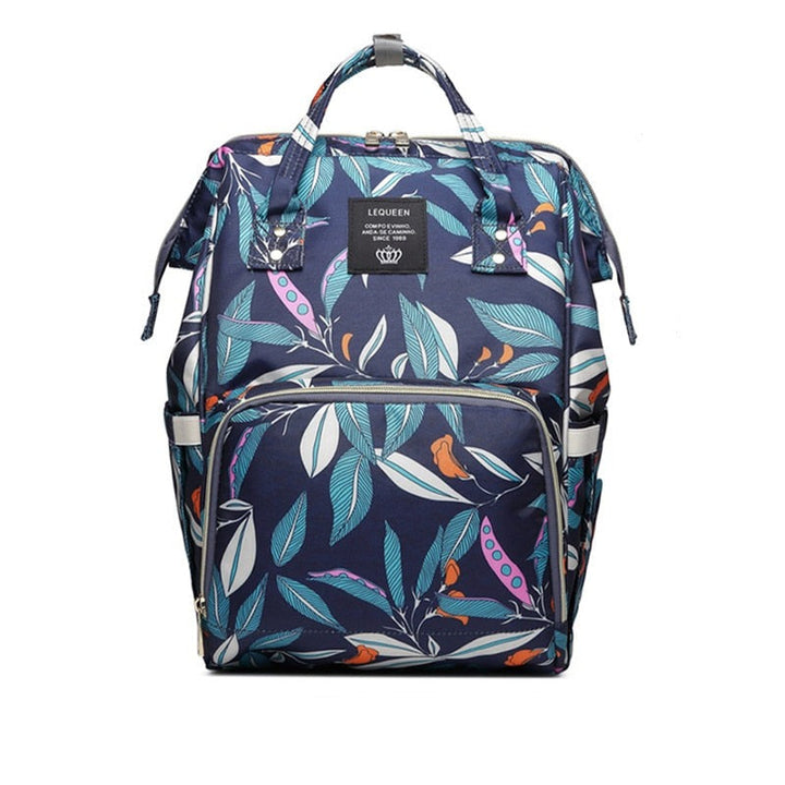 Maternity travel bag open wide to show spacious interior compartments
