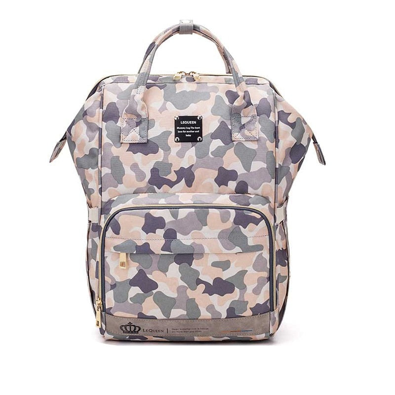 Waterproof diaper bag backpack showing side bottle pockets and zippers