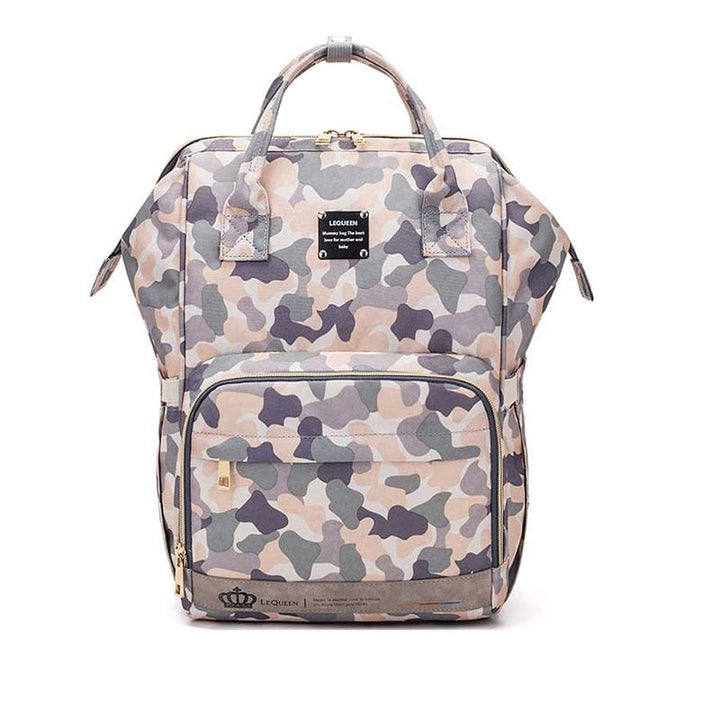 Waterproof diaper bag backpack showing side bottle pockets and zippers