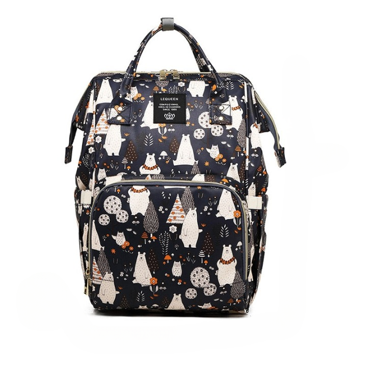 Parents essentials baby travel backpack worn by model outdoors