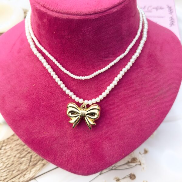 Double layered pearl neckline with a bow - Image 2