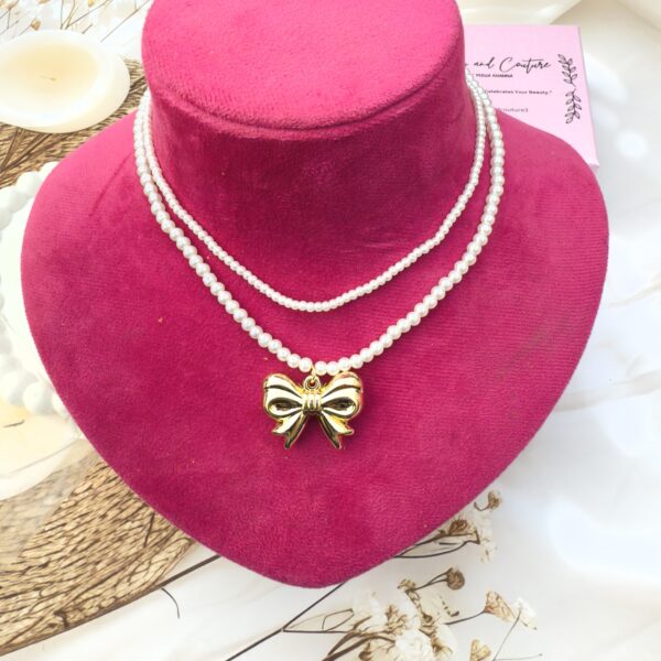 Double layered pearl neckline with a bow - Image 3