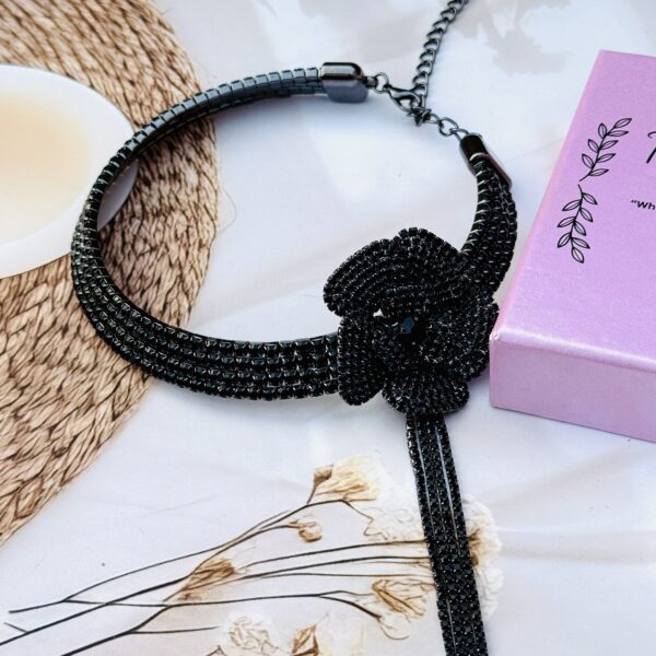 Trendy black round neckcuff with long tassels